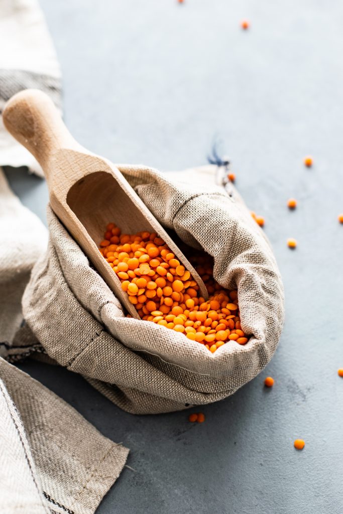 A spoonfill of lentils, a great source of protein, making them an ideal option for vegetarians.
