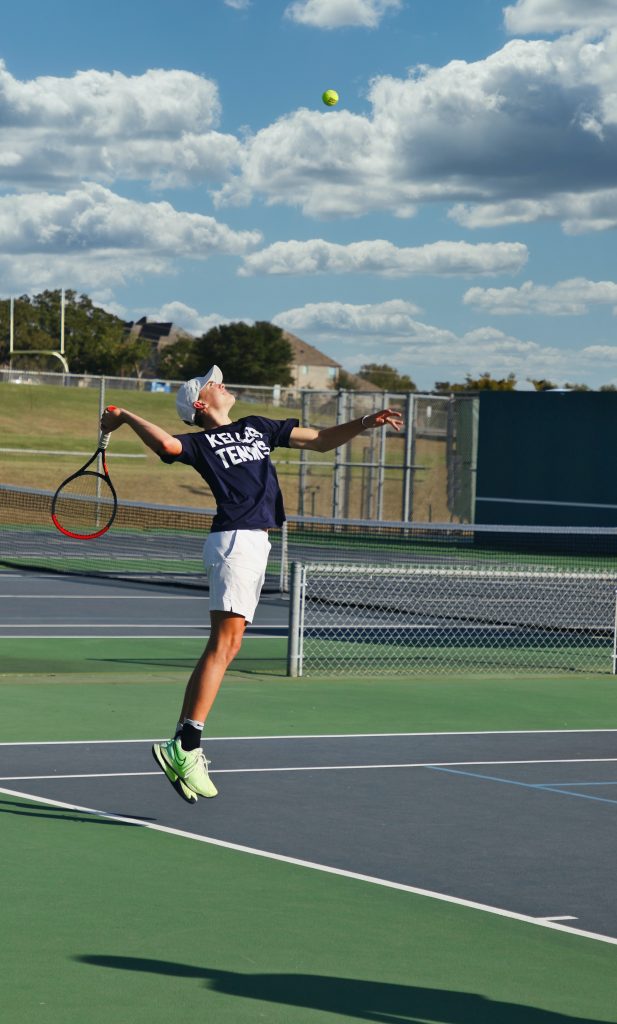 A man playing tennis, highlighting the importance of staying physically fit and active for good mental health.