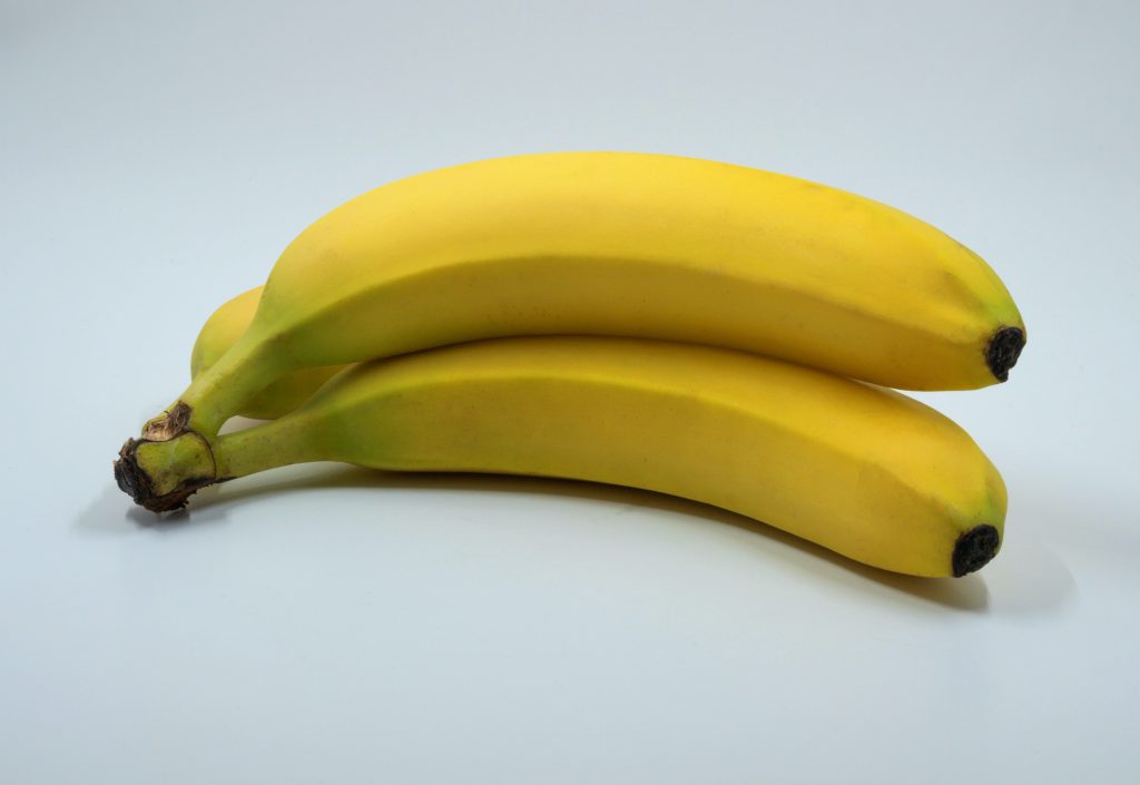 Close-up of three bananas, an excellent choice for those looking to gain weight.