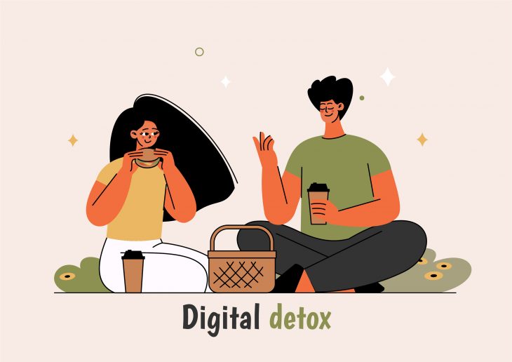 Image of a couple relaxing as they take a break from smartphones.