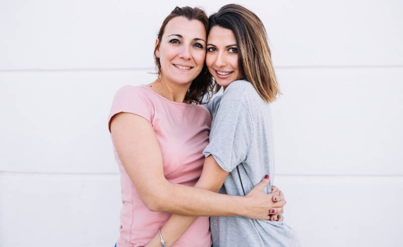 Image of two women sharing a moment of connection.