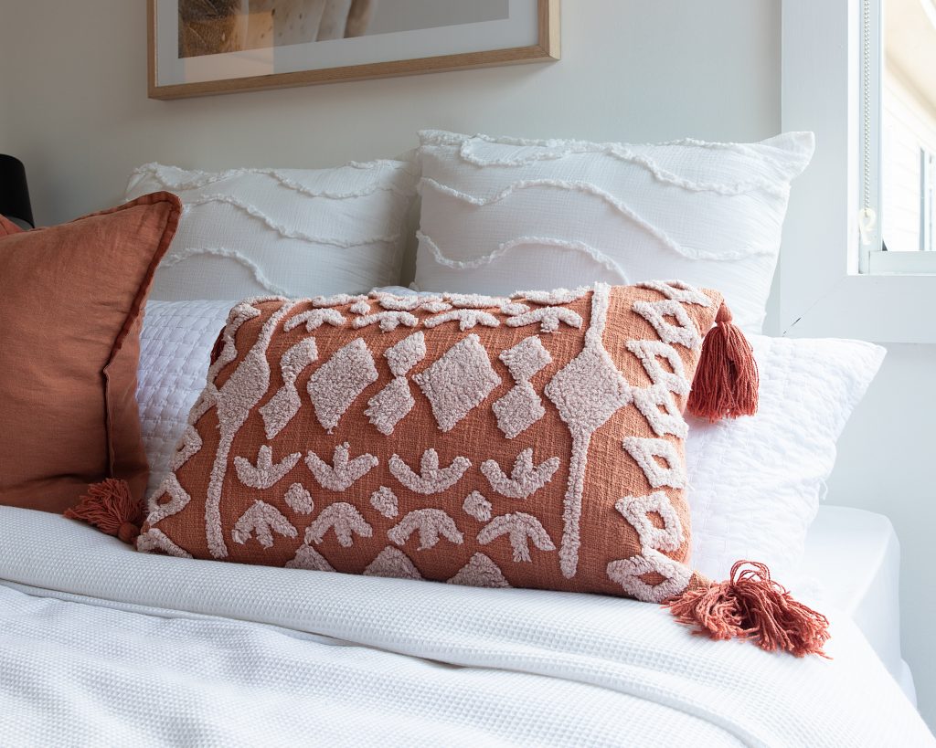 A stunning image showcasing beautifully embroidered household linens, washed and kept tidy.