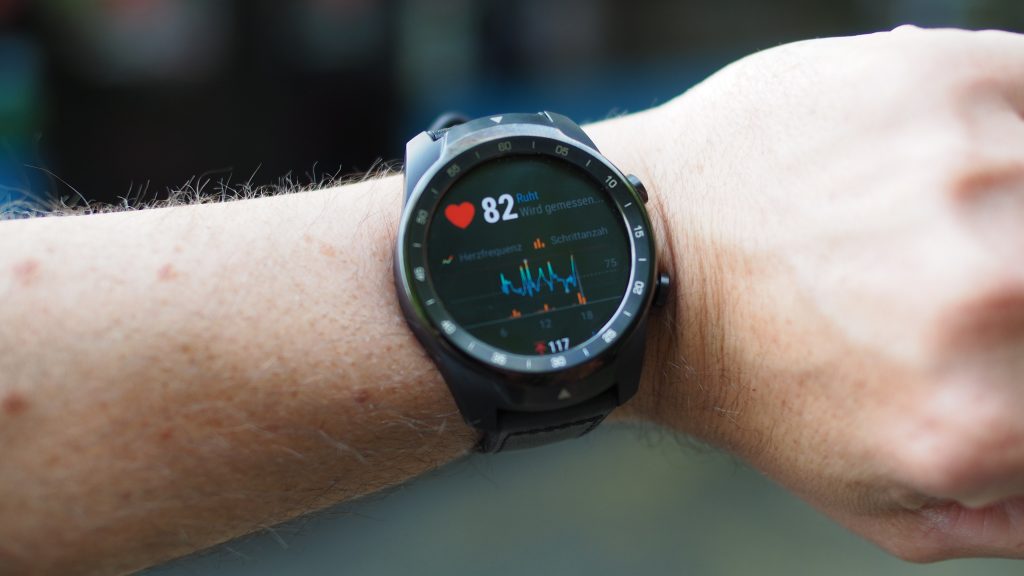 Smartwatch showing heart rate and health metrics on a wrist, highlighting how thyroid hormones impact heart rate.