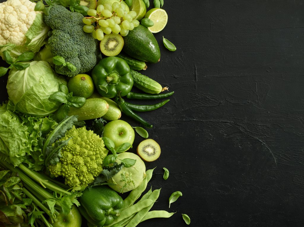 Fresh green vegetables and fruits, rich in magnesium, which is present in all green plants.