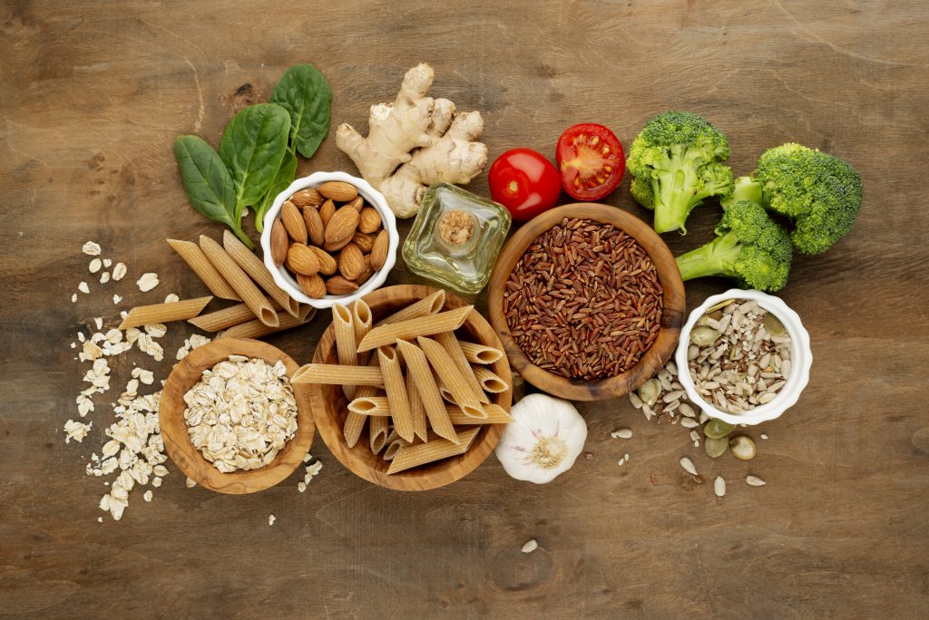 A mix of grains, nuts, fruits, and vegetables, essential for a healthy and balanced diet.